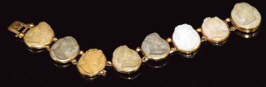 Victorian yellow metal bracelet set with lava cameos