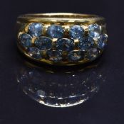A 9ct gold ring set with sapphires, size N, 5.9g