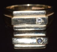 A 9ct gold signet ring set with a diamond, size U, 7.4g