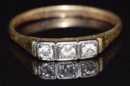 A 14k gold ring set with three diamonds, size P, 2.3g