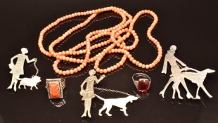 Chinese silver ring set with carved coral, a coral necklace, three Art Deco brooches in the form