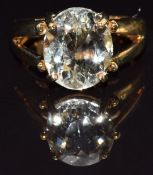 A 9k gold ring set with an oval cut kunzite, size M, 6.4g