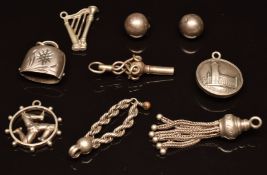 Victorian white metal watch key, Edwardian silver charm, white metal tassel charm and other white