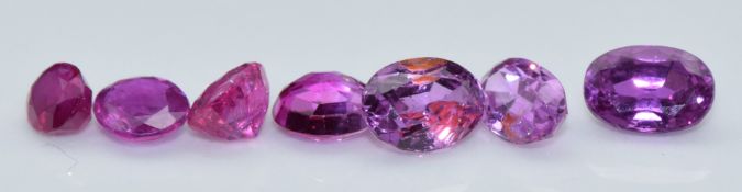Seven loose round and oval cut natural unheated Burmese rubies, total carat weight approximately 3.