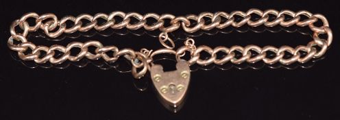 A 9ct rose gold curb link bracelet with heart padlock/ clasp, 8.6g