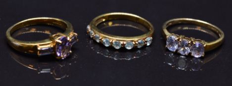 Three 9ct gold rings set with paste, size N, 6.3g