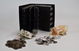 A quantity of UK and overseas coinage, some in an album, includes small silver content Queen