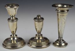 Hallmarked silver trumpet vase, height 14cm, hallmarked silver candlestick and a similar base