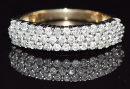 A 9ct gold ring set with three rows of diamonds, size N, 2.4g