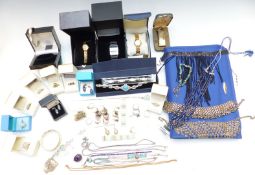 A collection of silver rings, bracelet, necklaces, Dunhill lighter, watches, etc