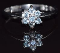 A 9k white gold ring set with topaz, size M, 1.8g