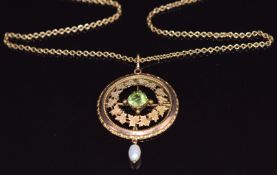 Edwardian 9ct gold pendant set with a round cut peridot and drop pearl with textured ivy decoration,
