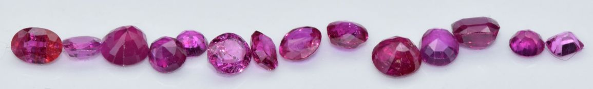 Fourteen loose round and cushion cut natural unheated Burmese rubies, total carat weight