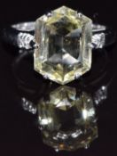A 9ct white gold ring set with citrine and diamonds, size M, 5.1g