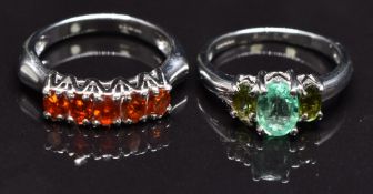 Two 9ct white gold rings, one set with fire opals and the other emerald and diopside, size N, 6.3g