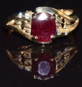 A 9ct gold ring set with a ruby and diamonds, size M, 2.8g
