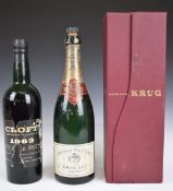 Croft 1963 Port and an empty Krug 1959 Champagne bottle