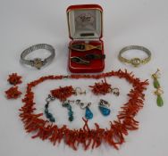 A collection of jewellery including coral, turquoise earrings, etc