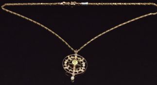 Edwardian 9ct gold pendant set with a round cut peridot, seed pearls and a drop pearl, on 9ct gold