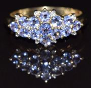A 9ct gold ring set with tanzanites, M, 2.5g