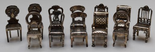 Set of twelve (six pairs) of place card holders in the form of chairs, H5cm