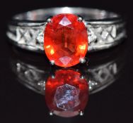 An 18ct gold ring set with an oval cut sapphire, size N, 4.2g