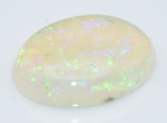 A loose oval cut opal measuring approximately 0.93cts