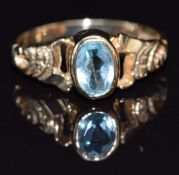 A 9ct gold ring set with an oval cut aquamarine, size M, 2.1g