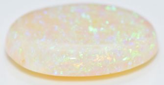 An 18.73ct loose natural oval fire opal cabochon with certificate