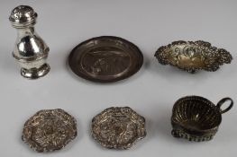 Hallmarked silver items comprising Edward VII pepper in the Georgian style, London 1905, maker