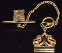 A rolled gold fob chain and seal