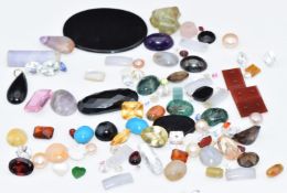 A collection of loose stones including turquoise, opal, heart cut mother of pearl, paste, moss agate