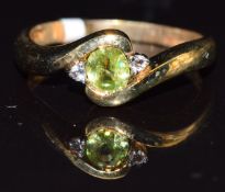 A 9k gold ring set with sphene and topaz, size N, 2.3g