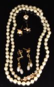 A single strand of cultured pearls with 9ct gold clasp set with a pearl, a pair of 9ct gold earrings