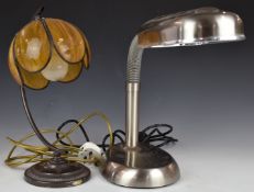 Two table lamps, one stainless steel and the other with and orange tulip shade, tallest 37cm