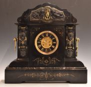 French marble cased mantel clock with classical figures to either side, cherubs, Grecian vase and