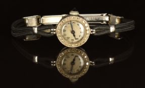 Kenwell 9ct white gold diamond set ladies wristwatch with blued hands, black Arabic numerals, silver