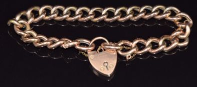 A 9ct rose gold curb link bracelet with heart padlock/ clasp, 17.1g