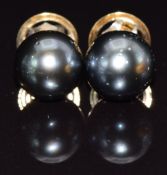 A pair of 9ct gold earrings set with a Tahitian pearl to each, 6.9g