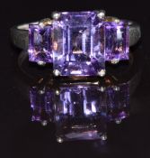 A 9k gold ring set with amethysts, size P, 3.6g