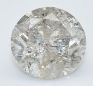 A loose round cut diamond measuring approximately 0.72cts