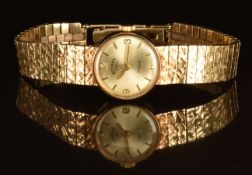Rotary 9ct gold ladies wristwatch with gold hands and hour markers, silver dial and 22 jewel