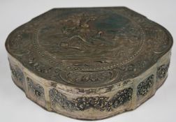 Continental silver trinket or dressing table box with hinged lid embossed with a scene of two lovers