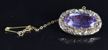 Victorian yellow metal brooch set with foiled paste, 7.4g