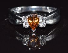 A 9k white gold ring set with zircon and topaz, size N, 3.6g