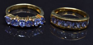 Two 9ct gold rings set with tanzanites, size N, 6.6g