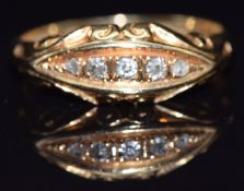 An 18ct gold ring set with five diamonds, Birmingham 1914, size M, 3g