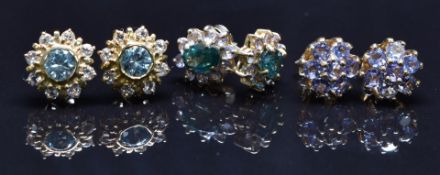 Three pairs of 9ct gold earrings set with tanzanite, zircon and quartz, 7.2g