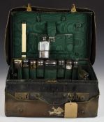 Mappin & Webb gentleman's travelling case, the fitted interior with many hallmarked silver bottles