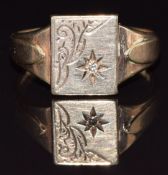 A 9ct gold signet ring set with a diamond in a star setting, size V, 4.4g